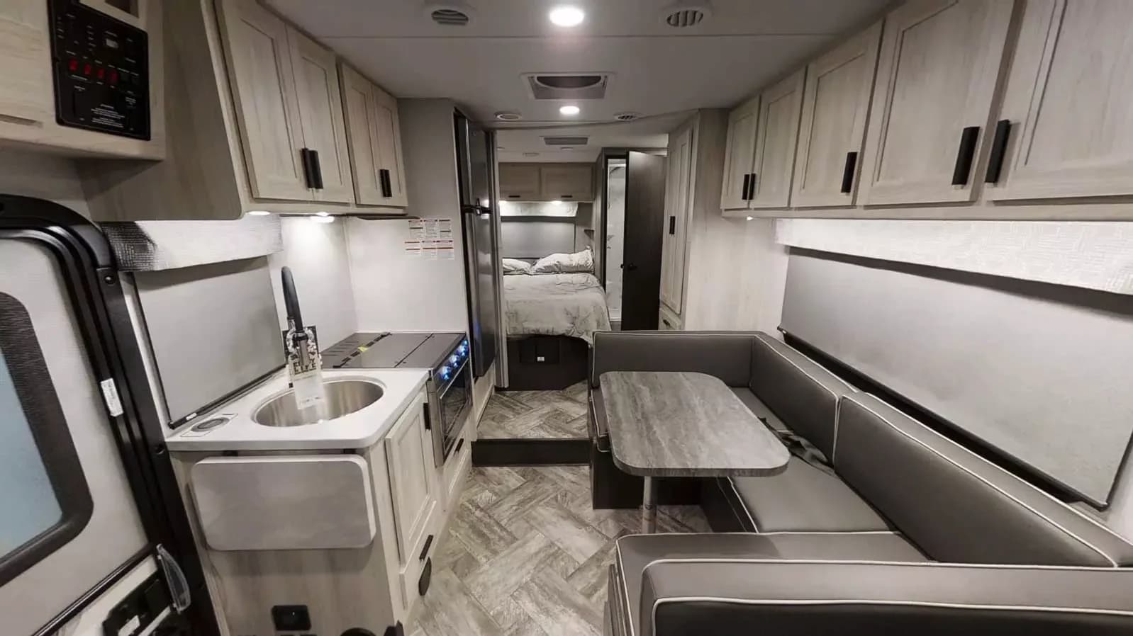 Sunseeker 2350 LE interior with U-dinette and queen bed
