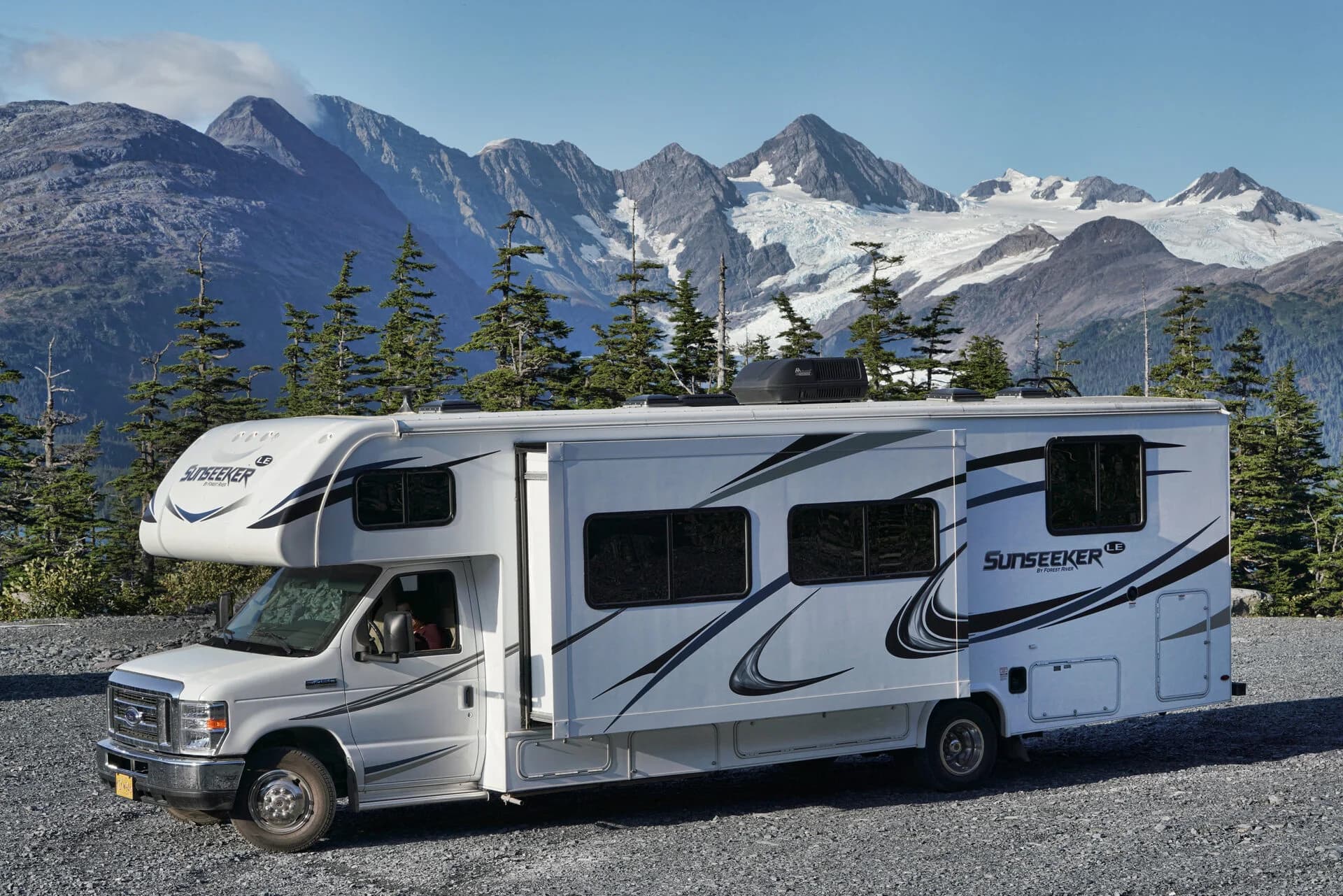 Sunseeker LE motorhome with mountains and glacier behind